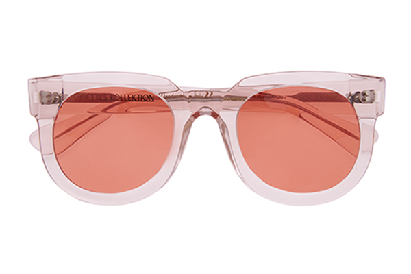 Produktbild von einer funky Sonnenbrille mit einer leicht rosa Fassung und mit orangefarbenen Gläsern